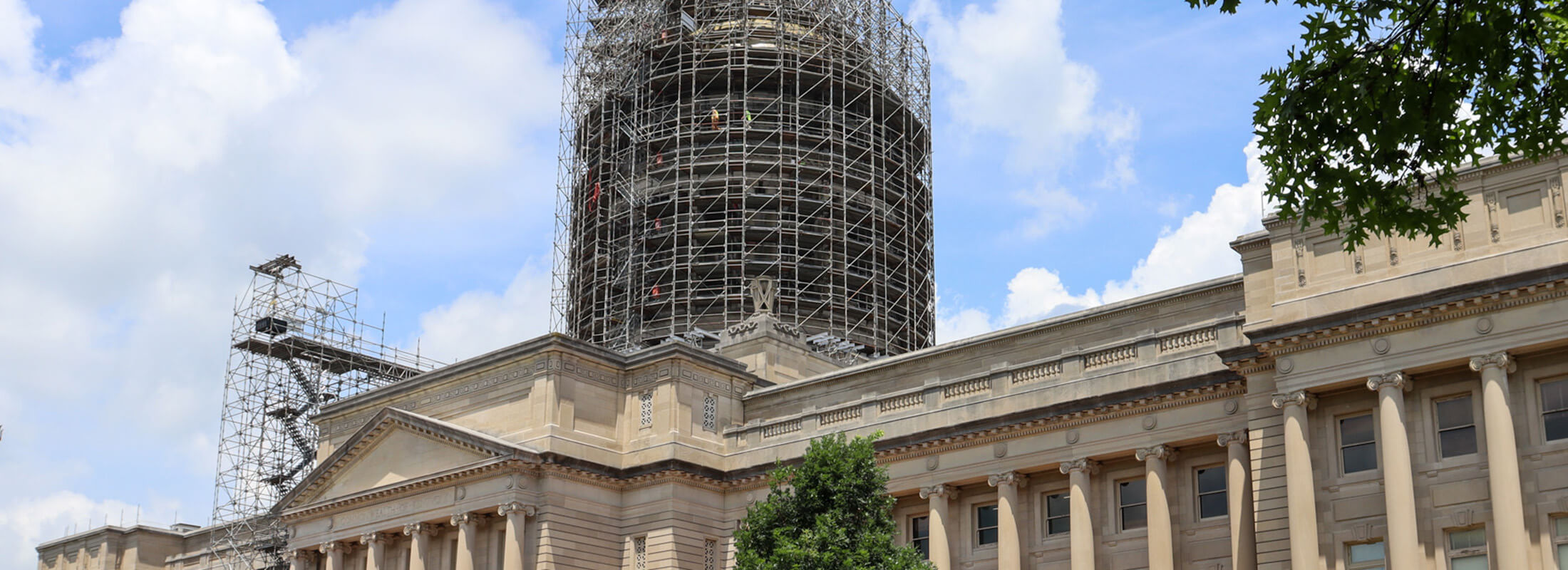 Kentucky's Capitol building with scaffolding around the center tower.
