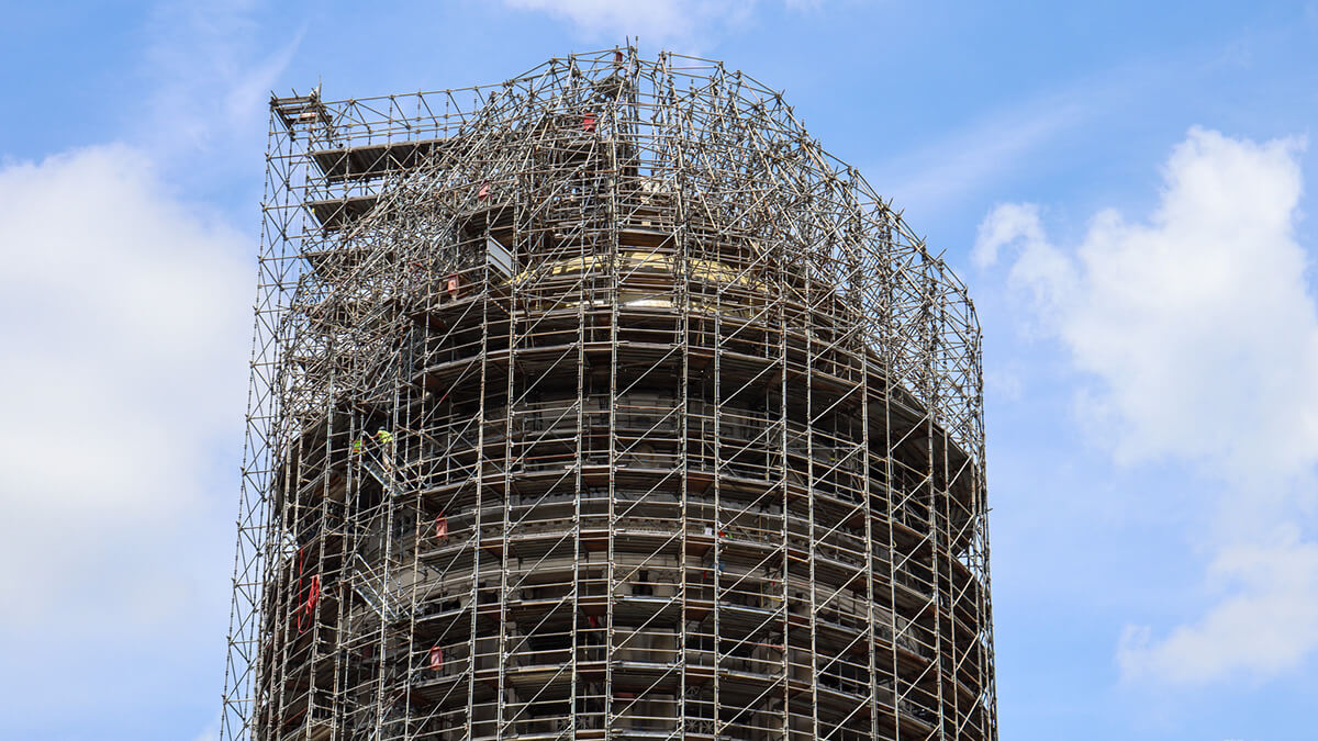 Close up of the Kentucky Capitol building's tower with scaffolding around it.