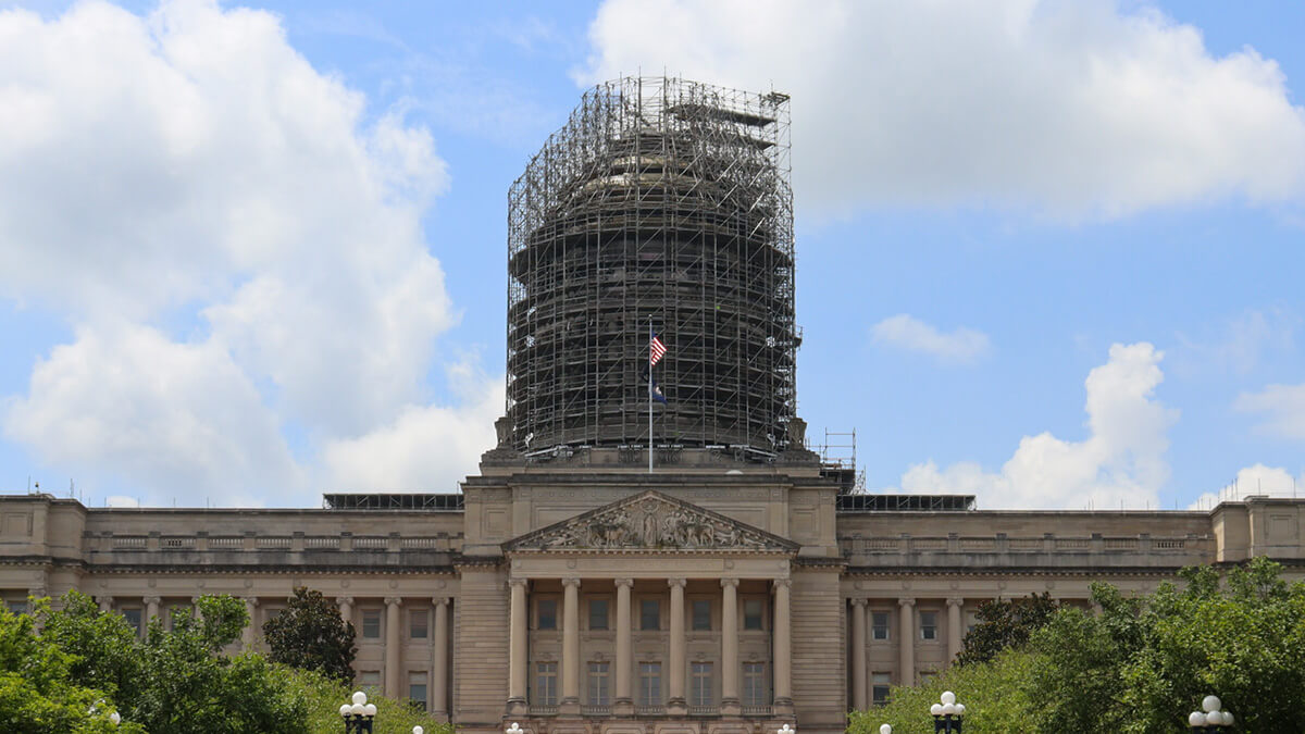 Wide view of the Kentucky Capitol building with scaffolding around the tower.